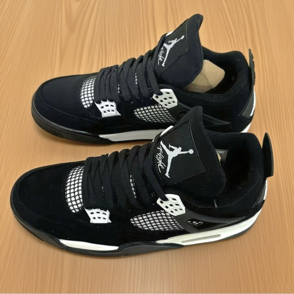 Jordan Men's Black and White Retro 4 Athletic Sneakers